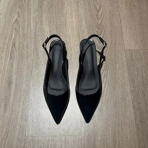 Elegant Black Pointed Slingback Heels with Adjustable Strap